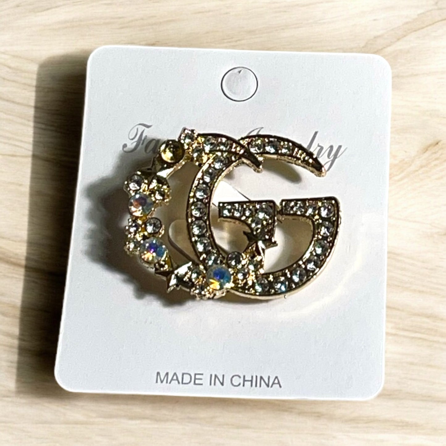 Gold GG Brooch