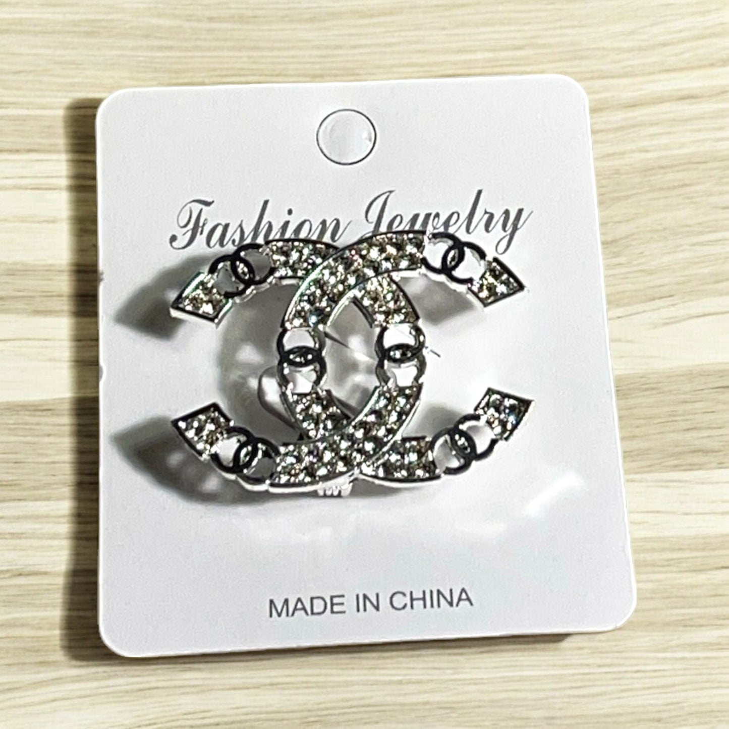 Silver CC Brooch with small CC Design