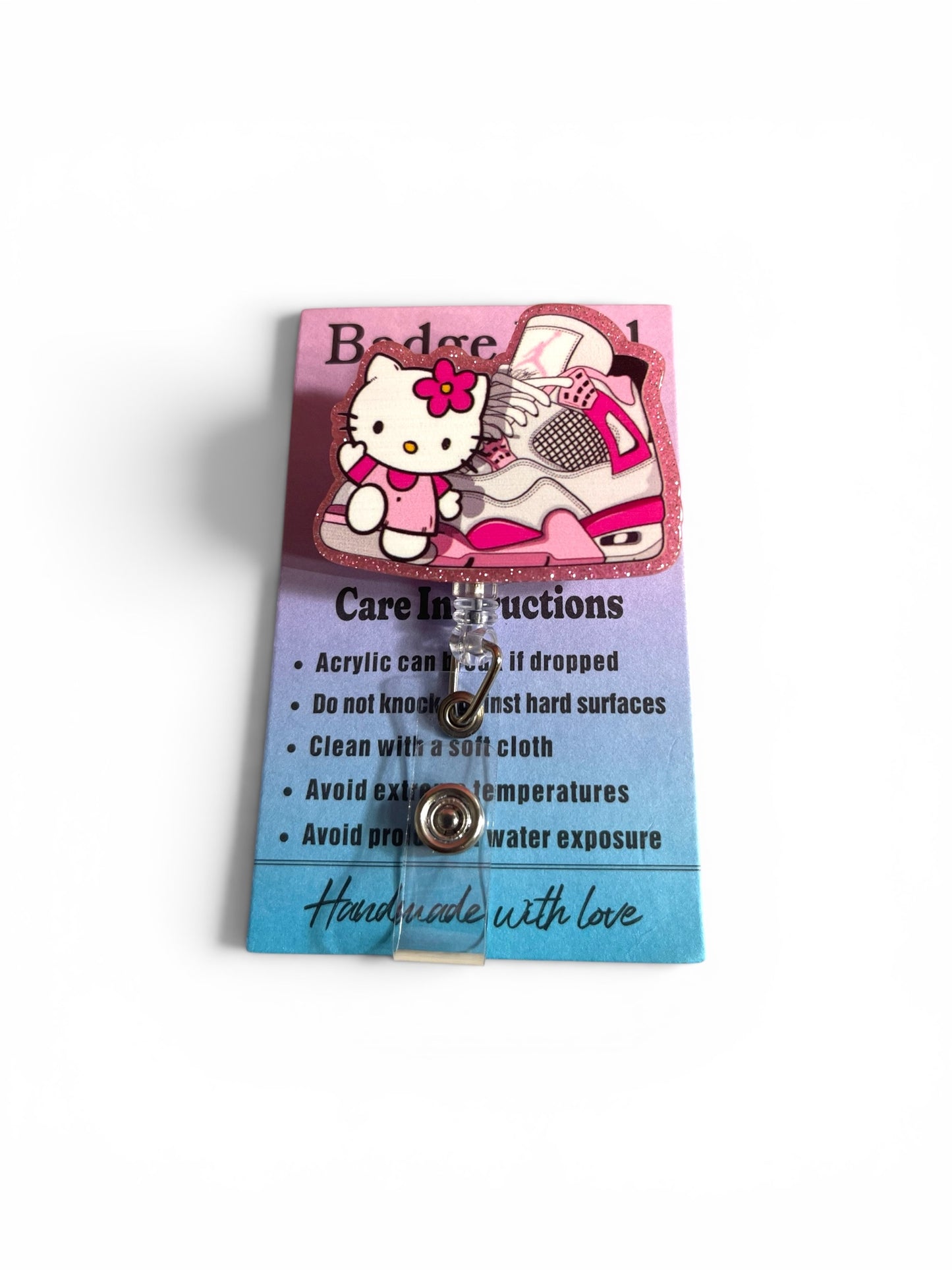 Hello Kitty x Nike Badge Reel