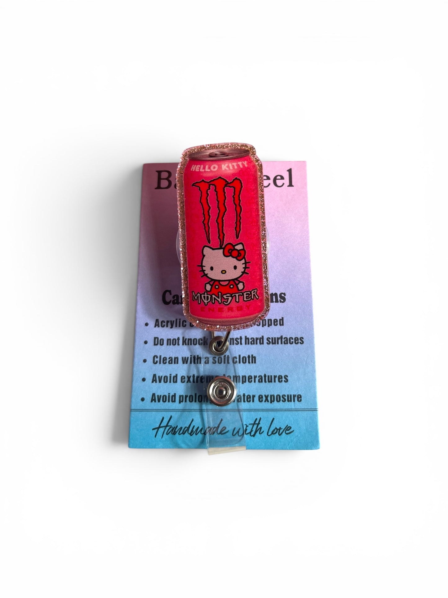 Hello Kitty Monster Drink Badge Reel